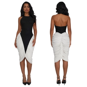 Elegant halter neck backless dress in black and white with side ruffle pleats