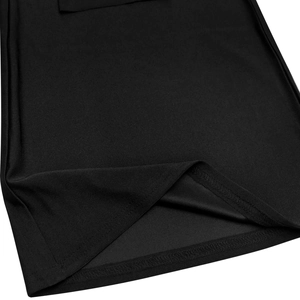 Detailed close-up showing the neat double-needle stitching on the black jumpsuit's hemline