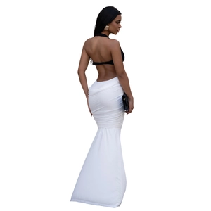 Detail of the back view showing the backless halter top and mermaid skirt silhouette