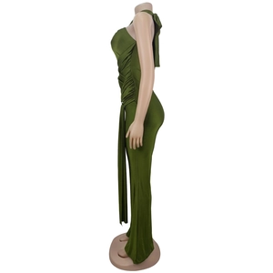 Detail of olive green halter neck dress featuring side ruching and long waist tassels