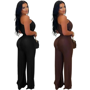 Detail of one-shoulder wide-leg jumpsuit in black and brown sleek fabric finishes