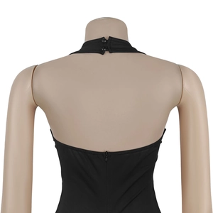 Detail view of the halter neck dress back with double button closure and hidden zipper