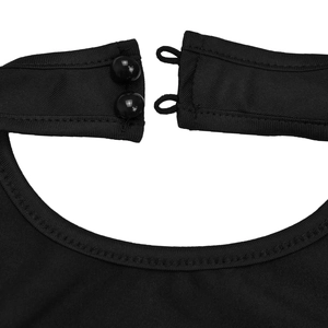 Close-up of black knit fabric texture with two glossy round buttons and elastic loops