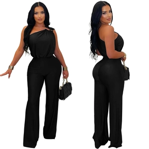 Detail of black one-shoulder wide-leg jumpsuit with asymmetric neckline and draped waist