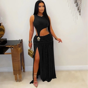 Sleeveless black cut-out maxi dress with high slit and elegant asymmetric waist design