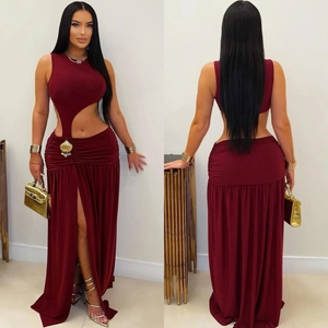 Detail of wine red cut-out dress with high slit, ruched waist and asymmetrical design