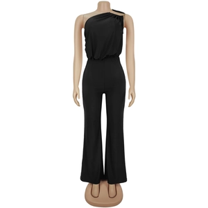 Detail of black one-shoulder jumpsuit featuring a pleated waist and wide-leg trousers