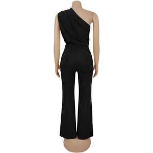 Detailed back view of a black one-shoulder jumpsuit with elastic waist and wide legs