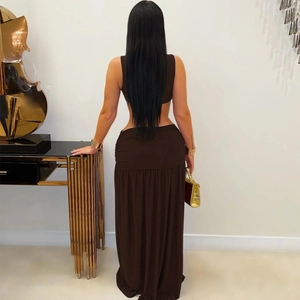 Detail of dark brown two-piece set featuring a sleeveless crop top and ruched maxi skirt