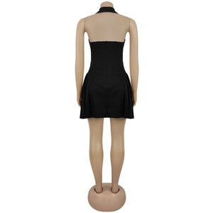 Back view of a black halter-neck mini dress showing the open back and ruched skirt details