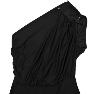 Detail of black one-shoulder jumpsuit with gold metal ring and draped pleated fabric