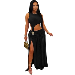 Detail of sexy black sleeveless hollow-out maxi dress with high slit and waist cutouts