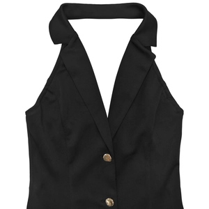 Detail of black halter vest showing v-neck suit collar and silver metal buttons