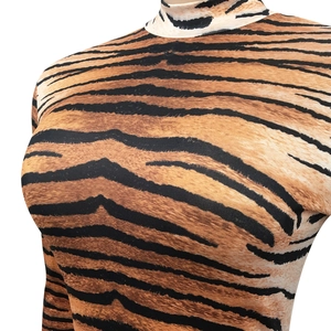 Close-up of mock neck tiger print bodysuit showing detailed fabric texture and patterns