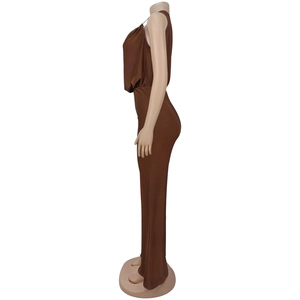 Side view of dark brown halter neck jumpsuit featuring elegant wide leg and cinched waist