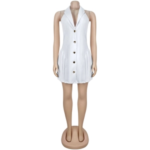 Detail of white sleeveless mini dress with blazer collar and button-up pleated skirt