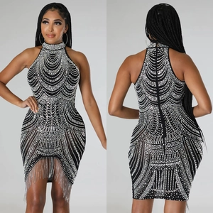 Women's black halter neck mini dress with rhinestone patterns and tassel hemline