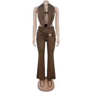 Detail view of deep brown two-piece set featuring halter neck and rhinestone buckle decor