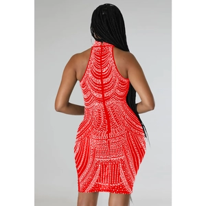 Detail view of red bodycon mini dress with rhinestone geometric patterns and halter neck