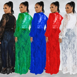 Detailed macro view of long lace cardigans in five vibrant colors with floral textures