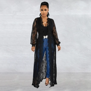 Close-up of black floral lace cardigan with elegant scalloped trim and sheer texture