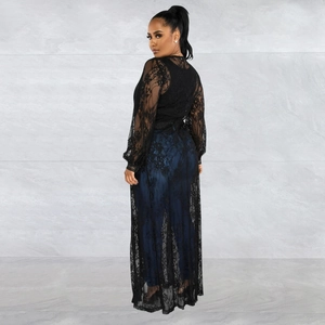 Detail of elegant black longline lace cardigan with floral patterns and semi-sheer texture