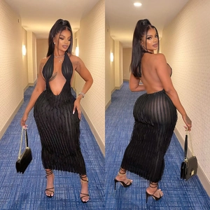 Elegant black halter maxi dress with hollow wave pattern and sexy open back design