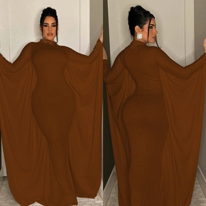 Detail view of brown batwing sleeve slim maxi dress with cape-style drape and mock neck