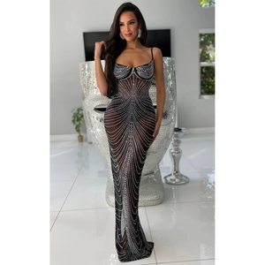 Detail of black sheer mesh evening gown with sparkling silver rhinestone line patterns