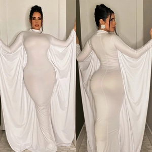 Detail view of white cape sleeve dress showing front and side slim fit silhouette