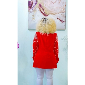 Rear view of a red blazer featuring decorative white pearls on long sleeves and slim fit cut