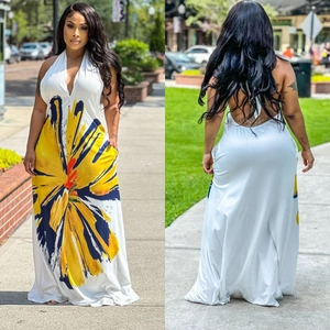 Elegant halter neck backless maxi dress with vibrant floral print and flowy white skirt
