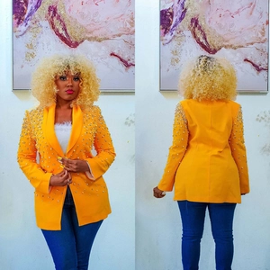 Detailed front and back view of a yellow long sleeve blazer with elegant pearl embellishments