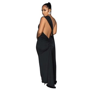 Detail of elegant black backless maxi dress with stylish ruching and floor-length hem
