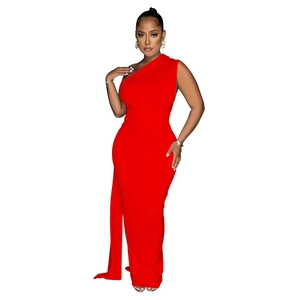 Detail of elegant red one shoulder floor length dress with side drape and slim fit cut