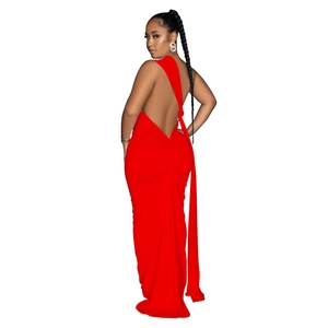 Detailed back view of red backless ruched maxi dress with elegant gathered fabric textures
