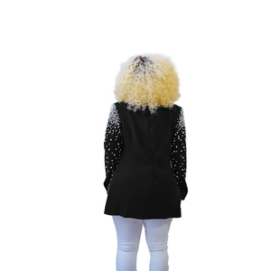 Detailed back view of long black blazer featuring elegant faux pearl embellishments on sleeves