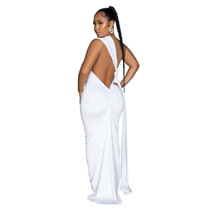 Detail showing the elegant backless design and ruched fabric of this white maxi dress