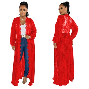 Detailed view of red floral lace cardigan with scalloped edges and gathered cuffs