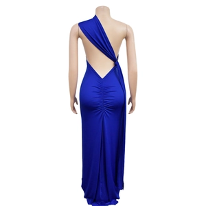 Detail view of royal blue backless dress with elegant ruching and draped asymmetrical hem