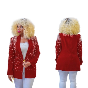 Detailed view of red blazer jacket featuring elegant white pearl bead embroidery on shoulders