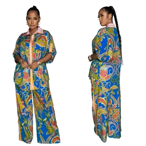 Detailed front and side view of blue paisley print shirt and wide-leg pants set