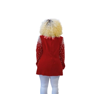 Detail of red slim blazer showing white faux pearls on the shoulder and sleeves back view
