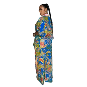 Side view of bohemian blue paisley two-piece set with wide-leg trousers and flowing top