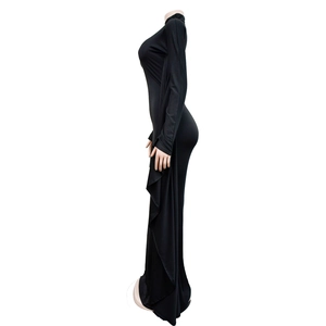 Detail view of the elegant black bodycon maxi dress with draping cape detail and high neck