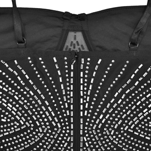 Close-up of black dress back featuring silver rhinestones and adjustable mesh straps