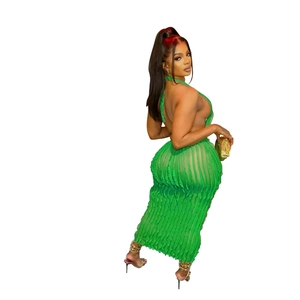 Detail view of emerald green bodycon dress with vertical wave pleated fabric and halter neck