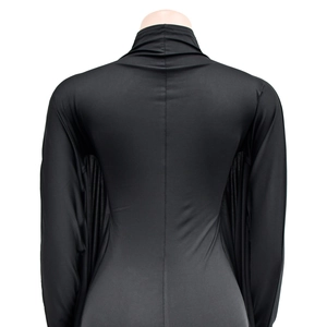 Detail view of the vertical stitching on back of a black long sleeve high neck bodycon dress