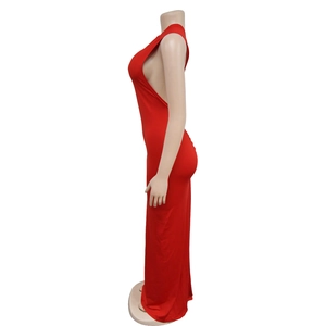 Detailed side view of backless red maxi dress with elegant pleats and ruched fabric