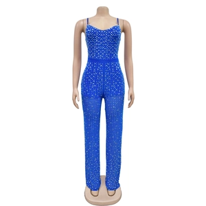 Close-up of royal blue rhinestone jumpsuit with sparkling silver crystals and sweetheart neckline